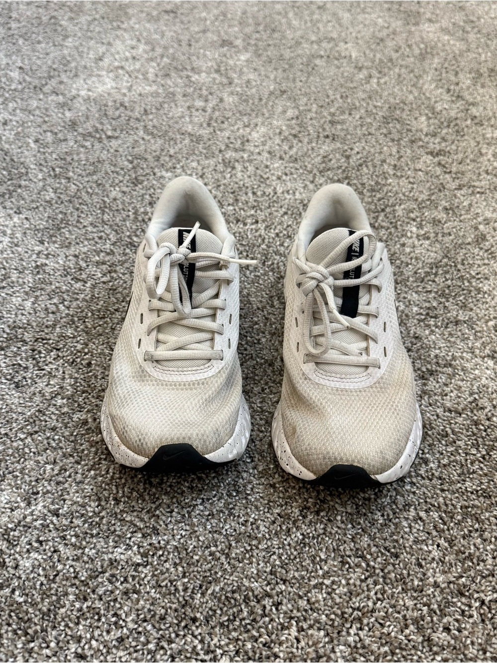 Nike Revolution Light Gray Athletic Sneakers with Black Accents